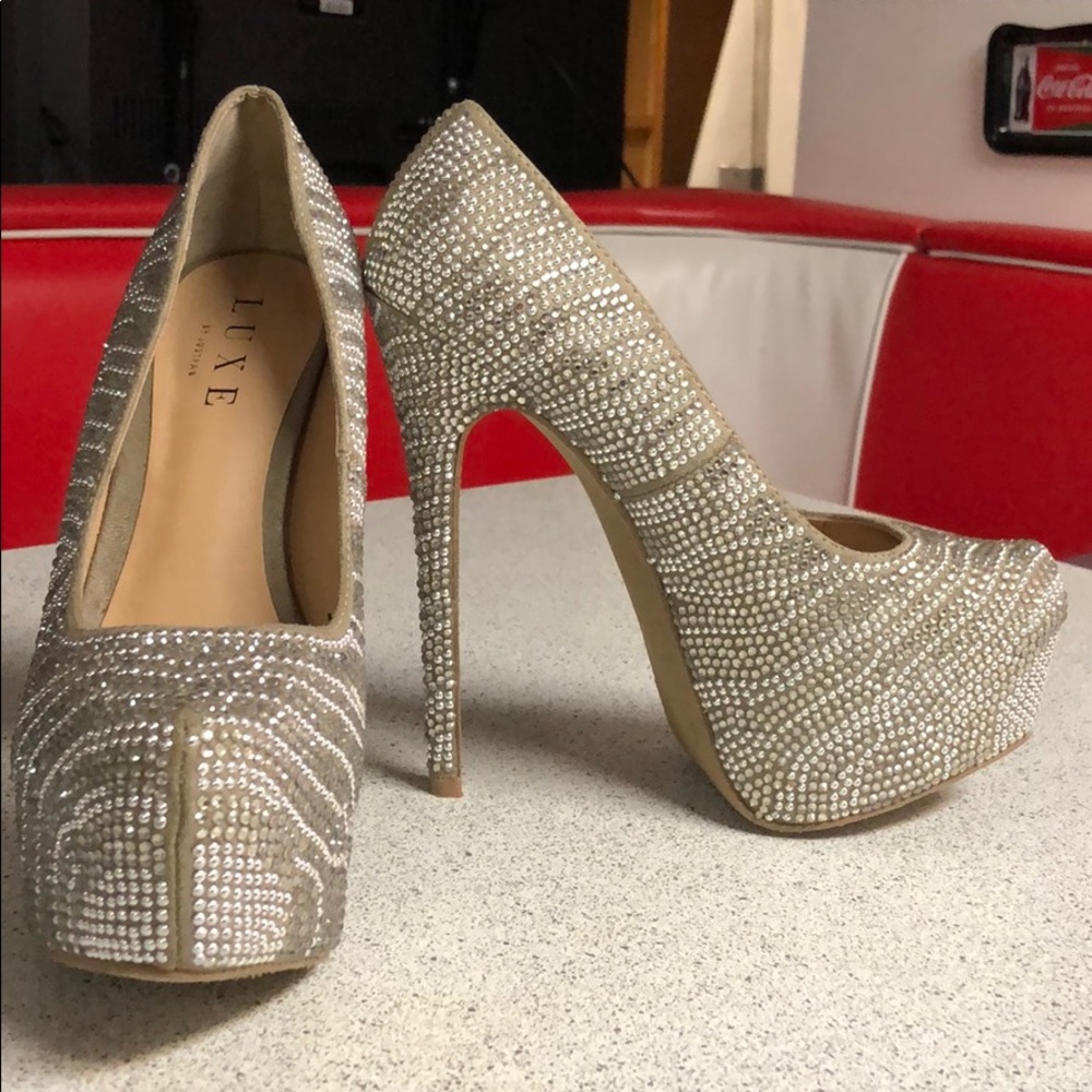New never worn silver sequin heels